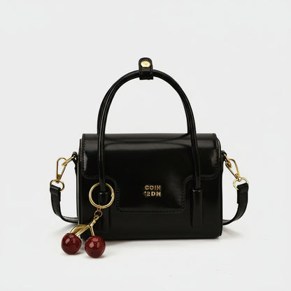 Chloe - Structured Sling Bag with Charm