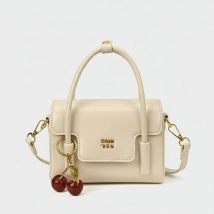 Chloe - Structured Sling Bag with Charm